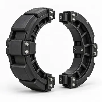 Industrial run-flat ring segment set with clamping hardware on white background