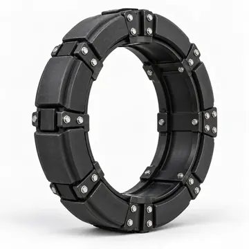 Segmented reinforced run-flat ring for heavy-duty wheel systems on white background