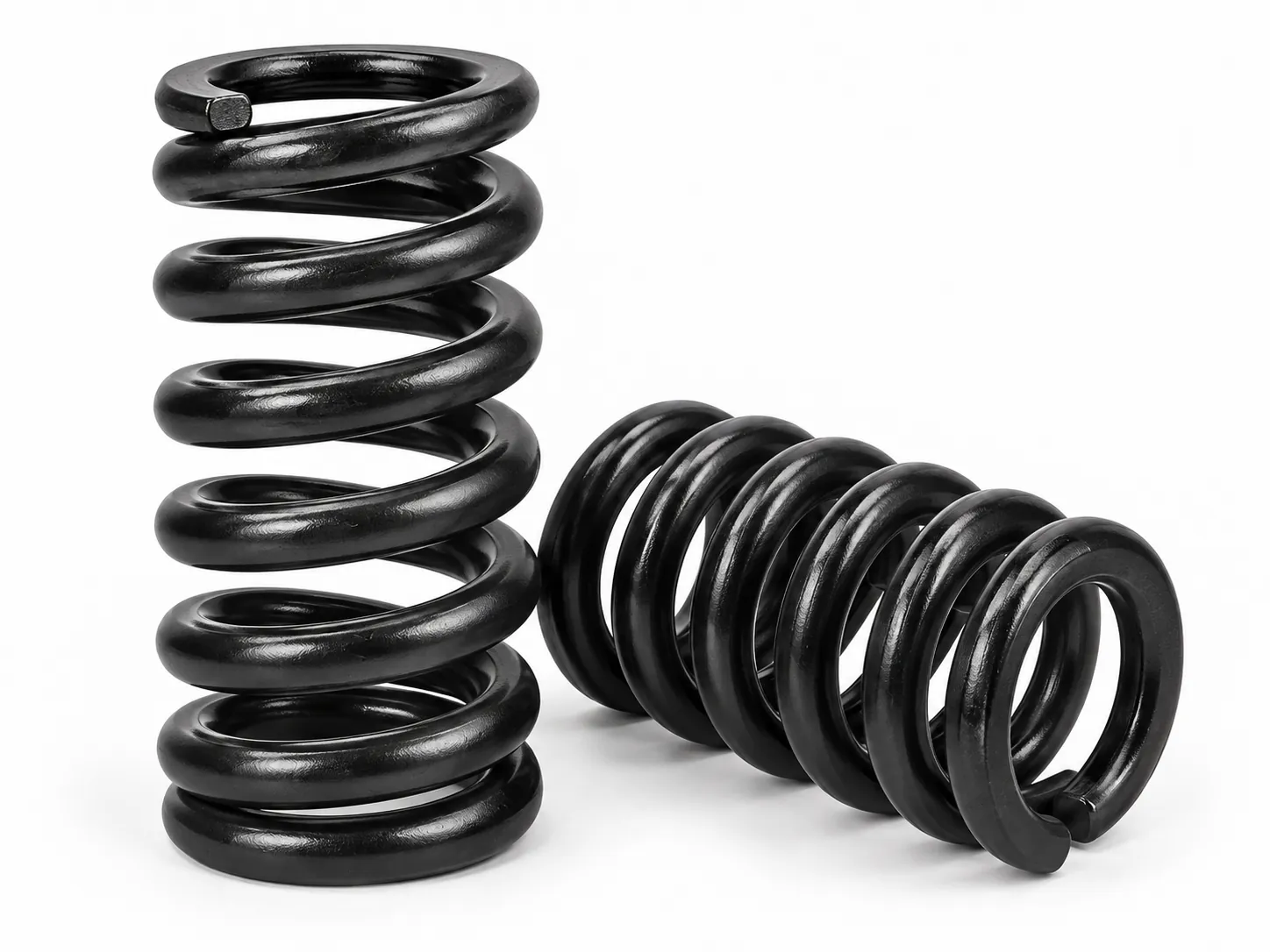 Heavy-duty black coil springs for armored vehicle suspension