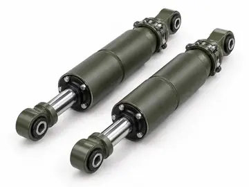 Pair of heavy-duty shock absorbers for armored vehicle suspension