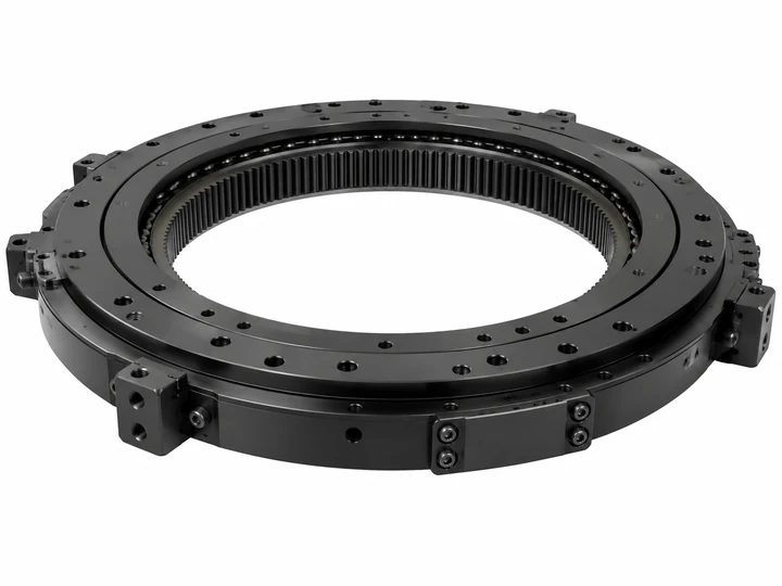 Low-profile black turret bearing ring with internal gear on white background