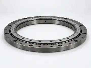 Powered turret bearing drive assembly with integrated controls on white background