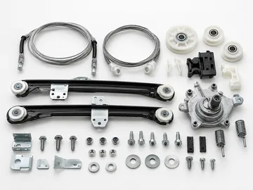 Window regulator repair kit with steel cables pulleys guide rails brackets springs and mounting hardware on white background
